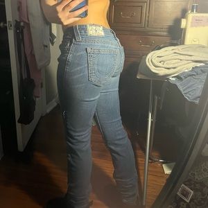 straight leg low rise true religion jeans with gray stitching